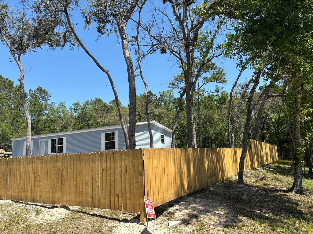 Photo of 11444 Lake Drive, New Port Richey, FL 34654 (MLS # W7874409)
