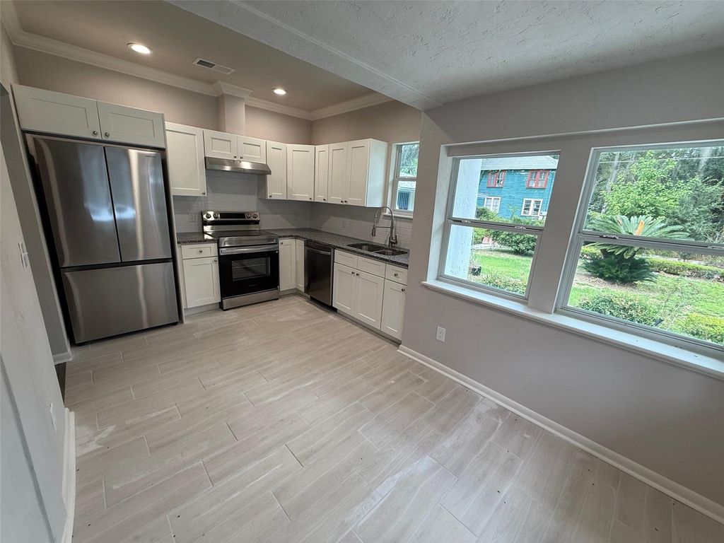 Photo of 614 NW 4th Street, Gainesville, FL 32601 (MLS # GC540615)