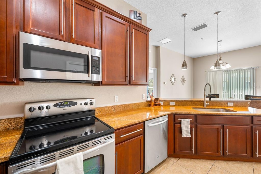 Photo of 10235 Cala Lily Trail #35A, Orlando, FL 32832 (MLS # O6384670)