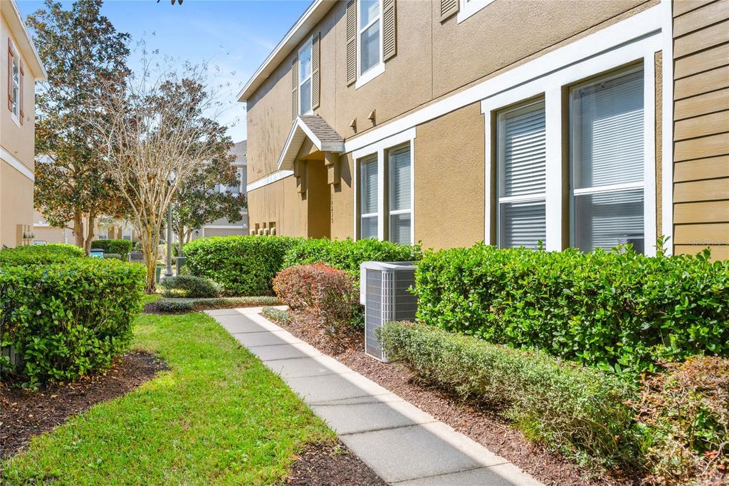 Photo of 10235 Cala Lily Trail #35A, Orlando, FL 32832 (MLS # O6384670)