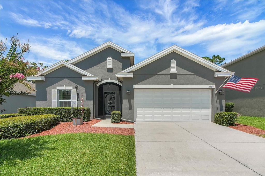 Photo of 2580 Plumadore Drive, Grand Island, FL 32735 (MLS # O6423845)