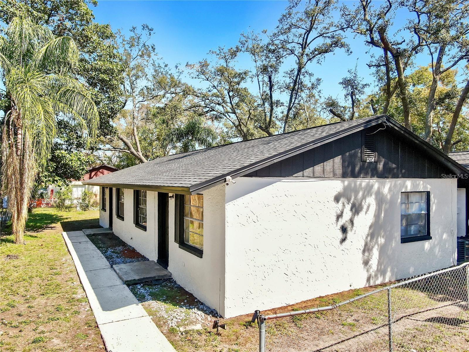 Amazing Rental Price! $1430....located in Tampa's Nebraska Avenue Heights neighborhood. This cozy 2-bedroom, 1-bathroom unit is part of a well-maintained duplex with off-street parking and a solid concrete block structure for added durability.. The property is close to local shops, dining, and major transportation routes, offering convenience and accessibility. This unit is perfect for those seeking comfort, affordability, and location. Schedule a tour today to see your future home!