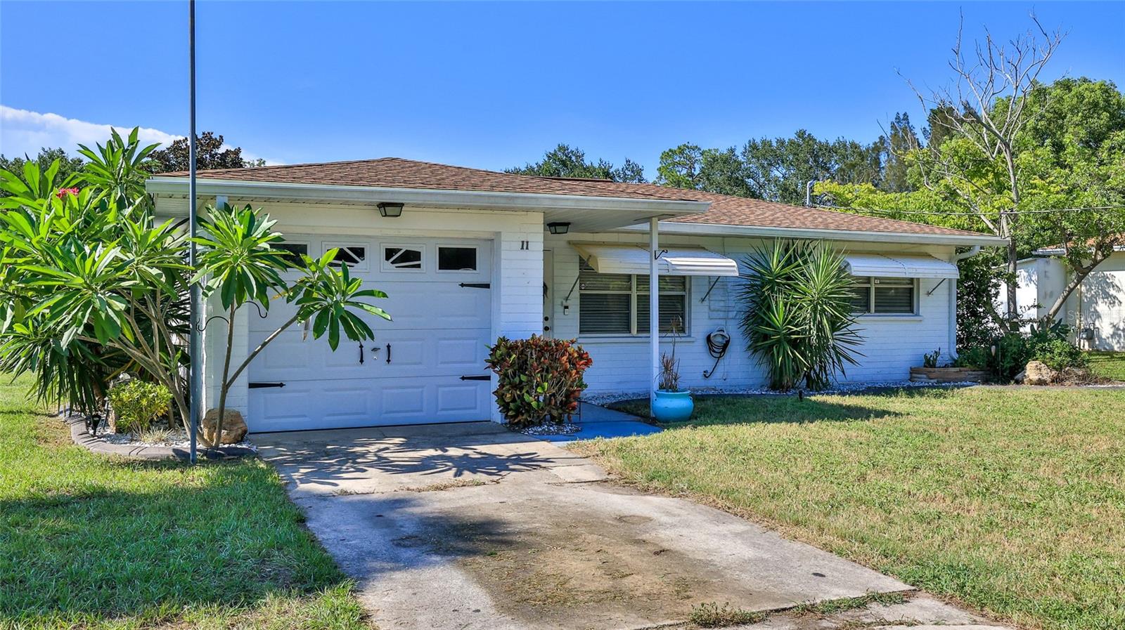 Looking for a Spacious Corner Lot Home with Exceptional Storage in New Smyrna Beach then this 3-bedroom, 1-bath home checks all the boxes. Whether you love boating, tinkering, or simply need extra storage or space for hobbies, this property delivers: an Oversized 2-car garage, a 12' x 10' storage shed, plus an Additional attached 1-car garage. Nestled in a quiet, established neighborhood, this home offers easy access to the river, historic Canal Street, and the scenic North and South Causeways leading to New Smyrna Beach. Best of all—no HOA! Bring your toys, your business, and your vision to make this space your own and freedom to enjoy your property your way! There are no warranties expressed or implied. All measurements are approximate. Square footage received from tax rolls. All information recorded in the MLS intended to be accurate but cannot be guaranteed.