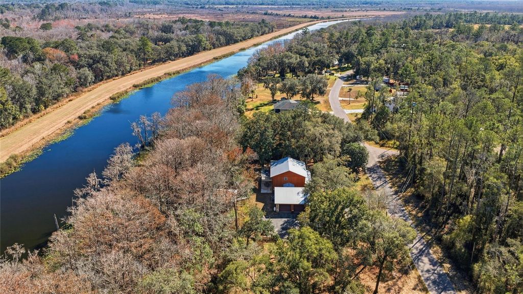 Photo of 351 Sequoia Dr, Ocklawaha, FL 32179 (MLS # OM717657)