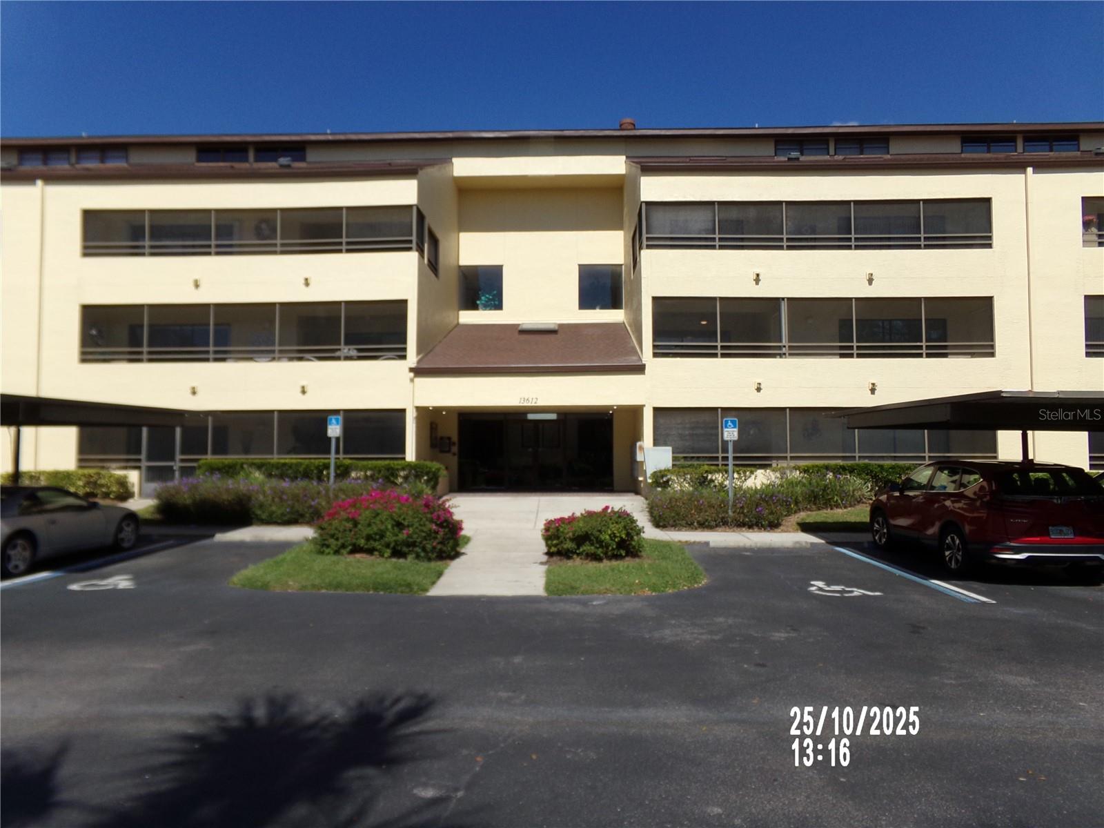 Located in the heart of Carrollwood Village, this Condo is close to everything within the Village. Located on the 3rd floor of building #13612, it's one of the larger units at 1,306 square feet and is located very conveniently across the hall from the elevator. There is Dinette space within the Living/Great room with a pass-thru from the Kitchen. The spiral staircase has been replaced with stairs to the 2nd floor bedroom/bath. Laminate flooring in all rooms - tile in the kitchen and baths. 2 full baths (one on 1st floor, one on the second) and both have a walk-in shower (no tub). Both bedrooms are very large and either can be used as the Primary bedroom.The sliding glass doors to the Living space and 1st floor bedroom provide access to the balcony, extra storage space and access to the sitting area off the 1st floor bedroom. The water heater was replaced in 2021. Very close to the County Park/play area and the Carrollwood Cultural Center.