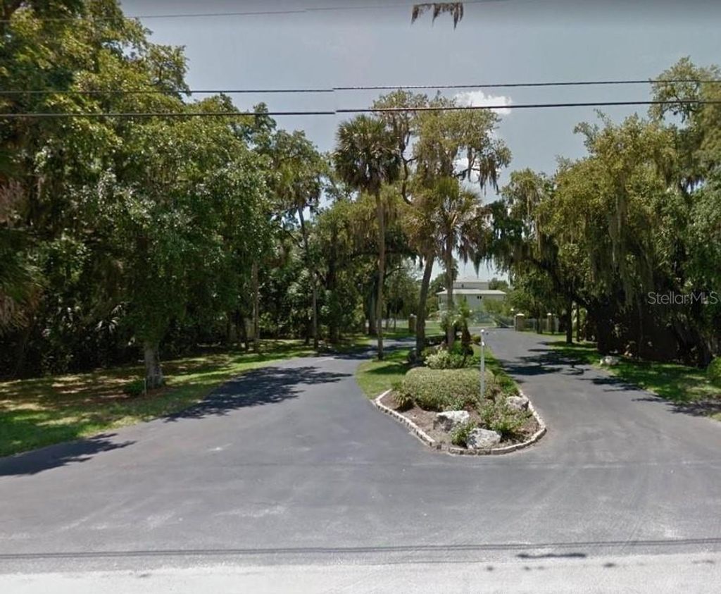 Photo of 5401 Tropical Woods Court, Port Richey, FL 34668 (MLS # O6406670)