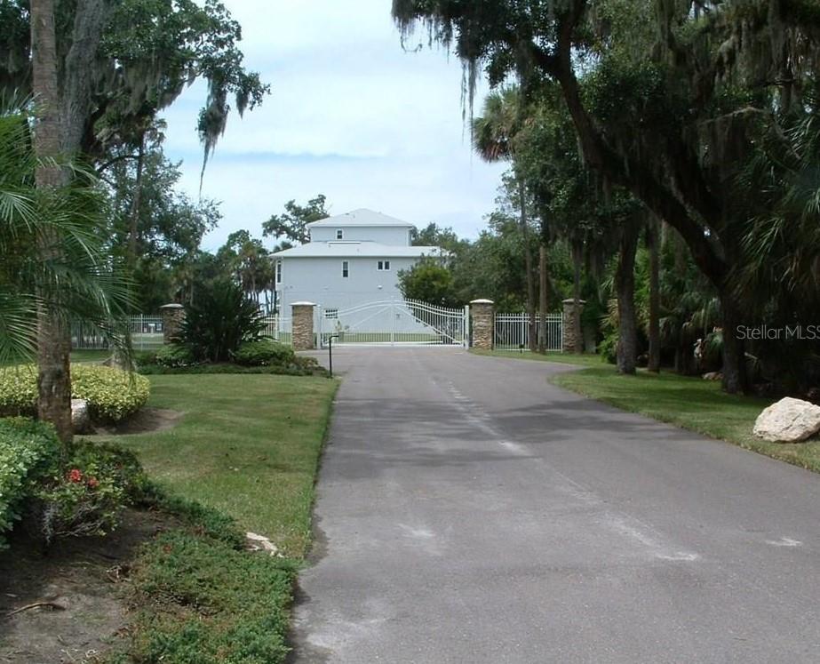 5401 TROPICAL WOODS COURT