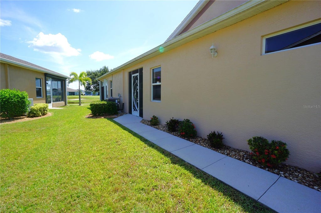 Photo of 1840 Knights Bridge Trail, Port Charlotte, FL 33980 (MLS # C7529454)