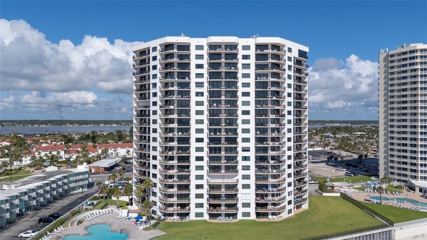 Escape the CRAZY in this magnificent peaceful oceanfront condo in beautiful Daytona Beach Shores.  This 2 bedroom 2 bath unit is meticulously maintained and ready for you to move in! The Oceanfront beauty is being offered fully furnished and ready for the new owners to relax and enjoy the amazing beachside lifestyle.  The kitchen has been opened up and professionally designed with an extra large solid surface island perfect for dining and entertaining. The open floorplan and endless ocean views make this home a perfect place for a vacation or a full time residence.  Wake up in your primary bedroom to a stunning sunrise then enjoy your morning coffee on the large balcony while watching the dolphins play!  Enjoy the oceanfront pool, fitness center and other ammenities including your reserved parking space in the garage.  If the resort lifestyle is what you are looking for, this home is a MUST see!