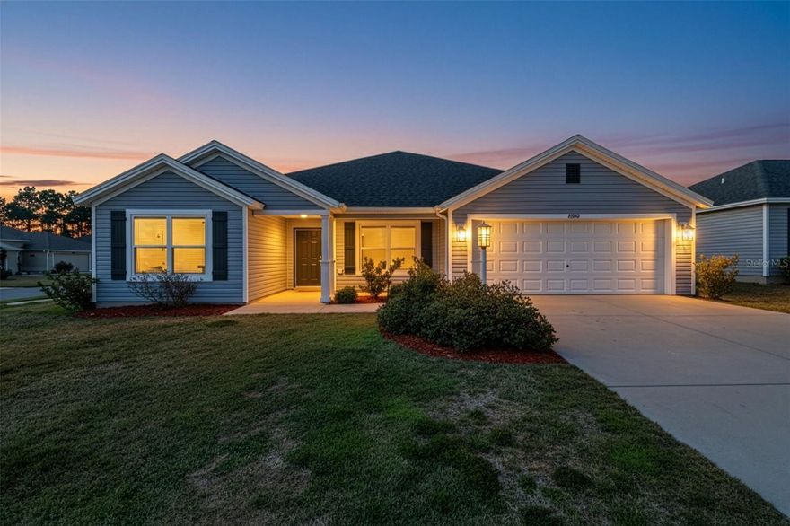 One or more photo(s) has been virtually staged. FABULOUS 4/2 home with SCREENED LANAI and OVERSIZED 22’x28’ GARAGE on a SPACIOUS CORNER LOT with ROOM FOR A POOL in the highly desirable, family-friendly, non-age-restricted, GATED community of Oxford Oaks! NO BOND! JUST MINUTES from The Villages retirement community, The Villages Charter Schools, and CR466 offering easy access to a plethora of shopping, dining, banking, medical and more! A charming FRONT PORCH, COVERED ENTRY VESTIBULE, and sidelit door welcome you in to the GENEROUS foyer. The interior of this GORGEOUS home features an EXPANSIVE OPEN LAYOUT with HIGH ceilings and LUXURY VINYL PLANK flooring throughout the kitchen and main living areas. The STUNNING GOURMET kitchen boasts NAVY and WHITE SHAKER cabinetry, NEUTRAL countertops, STAINLESS appliances, built-in DOUBLE PANTRIES with ROLLOUTS, corner LAZY SUSAN, and a CENTER ISLAND with EAT-IN breakfast bar. The VOLUMINOUS living and dining rooms feature FOUR-PANEL SLIDING GLASS DOORS that lead to the SCREENED LANAI. This FANTASTIC space overlooks the LARGE CORNER LOT and is ideal for ENTERTAINING friends and family or simply RELAXING with your morning coffee, evening cocktail, or a good book! Back inside, the luxurious primary bedroom features a TRAY ceiling, three windows, and a SPACIOUS WALK-IN closet. Its en-suite bathroom boasts NAVY SHAKER cabinetry, NEUTRAL countertops, DOUBLE sinks, LINEN closet, TILED WALK-IN shower, and a SEPARATE water closet. Near the foyer, a SPLIT FLOOR PLAN places two additional bedrooms and a second bathroom behind a POCKET DOOR creating PRIVATE sleeping quarters. Bedroom two offers DOUBLE windows and a built-in closet. The second bathroom features a NAVY SHAKER vanity with NEUTRAL top, and TILED tub and shower combination. The third bedroom boasts a LARGE window and a built-in closet. An additional separate fourth bedroom lies across the foyer, making it perfect for a quiet home office or guest room. It features DOUBLE windows and a built in closet. An INTERIOR laundry room boasts LVP flooring NAVY SHAKER cabinetry, shelving, and a built-in UTILITY SINK. Completing the package is an OVERSIZED 22’ x 28’ two car garage with PLENTY of room for parking ad storage! DON’T MISS YOUR OPPORTUNITY to make this AMAZING HOME YOUR OWN! The Oxford Oaks Community offers INCREDIBLE AMENITIES including: a Resort Style Swimming Pool; Pickle Ball, Tennis, and  Basketball Courts; Outdoor Exercise Equipment; and a fabulous Children’s Playground! All for a LOW HOA payment with NO ADDITIONAL FEES or BONDS! Conveniently located near the intersection of 466 and 301, Oxford Oaks is JUST MINUTES from The Villages retirement community, The Villages Charter Schools, and CR466 offering abundant shopping, dining, banking, medical, and more! DON’T MISS THE OPPORTUNITY to make this FANTASTIC HOME in an AMAZING LOCATION YOUR OWN! Please watch our walkthrough video and call today to schedule your Private Showing or Virtual Tour!