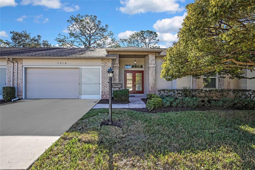 Photo of 7418 Baywood Forest Circle, Spring Hill, FL 34606 (MLS # TB8470276)