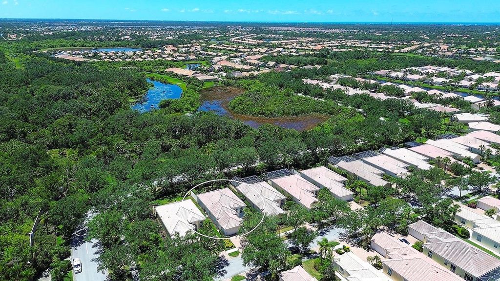 Photo of 5877 Ferrara Drive, Sarasota, FL 34238 (MLS # A4652663)