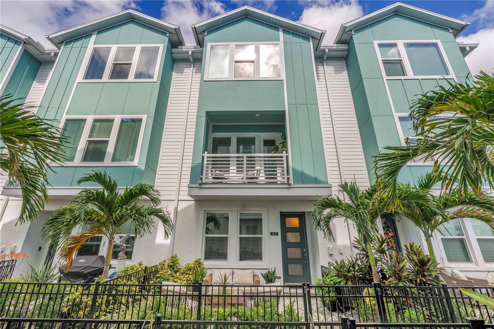 Experience Elevated Urban Living in the Heart of Grand Central!
Welcome to this better-than-new 3-bedroom, 3.5-bathroom townhome located in the vibrant Grand Central District of St. Petersburg. Nestled within a gated community offering secure alley and courtyard access, this newer construction home delivers the true Florida lifestyle with a modern urban twist.
Step inside to find a thoughtfully designed floor plan where each bedroom features its own private ensuite, offering comfort and privacy for family and guests alike. The main living area boasts an open-concept layout with a spacious kitchen, complete with an oversized island, pantry, and upgraded appliances. Entertain with ease in the connected dining and living areas, enhanced by a built-in dry bar and beverage fridge. A recently renovated powder bath with custom wallpaper and tile adds a touch of designer flair.
Upstairs, the expansive primary suite includes a walk-in closet with custom built-in cabinetry and a spa-inspired ensuite bath. A second upstairs bedroom also includes its own ensuite, perfect for guests or a home office.
Additional highlights include a 2-car attached garage equipped for your electric vehicle, high-end finishes throughout, and the convenience of low-maintenance townhome living — all just steps from the shops, dining, and culture of Grand Central and Downtown St. Pete.
Don’t miss this opportunity to own a stunning home that blends luxury, location, and lifestyle! Transferable builder warranty! Transferable AC warranty!