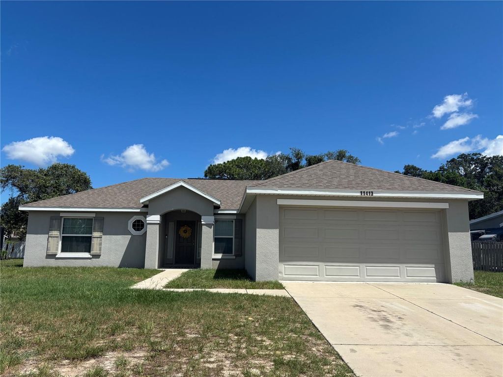Photo of 11413 Sand Hill Avenue, Spring Hill, FL 34608 (MLS # W7887024)