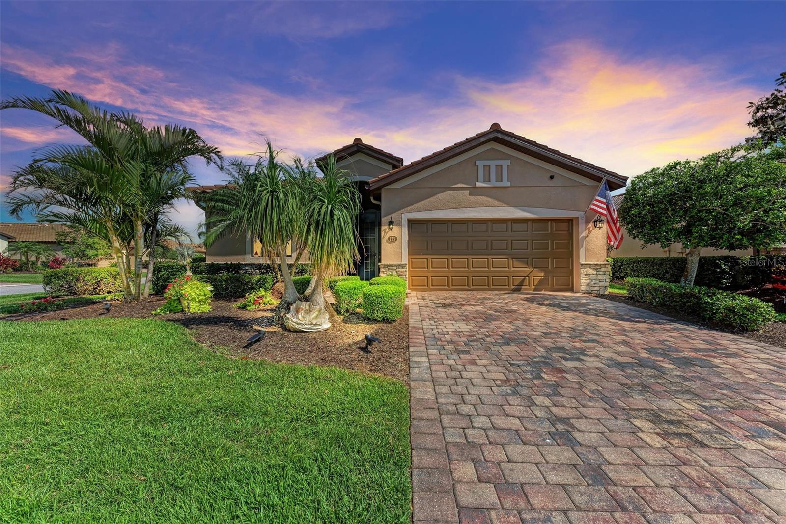 PRICE ADJUSTED FOR QUICK SALE!! Offering the perfect blend of comfort and style, this RECENTLY REDUCED single family home in the gated resort community of River Strand Golf and Country Club is ready and waiting for its new owners to enjoy! The Capri model has an attractive OPEN CONCEPT design with a large main living space that seamlessly combines the dining and living areas. Overlooked by the large eat-in kitchen with breakfast bar, both hosts and guests will feel right at home gathering, relaxing and entertaining. Sliders lead to the screened lanai, a tranquil place to enjoy the Florida weather and water views and plenty of room to add a pool too. This MOVE-IN READY property is large enough for a primary residence while being manageable as as a second home or rental property as well. The primary suite is generous, with a large walk-in and spacious en-suite completing the inviting space. Two cozy guest rooms and a guest bath adjacent fill the other side of the home. Updated light fixtures and fans, a recently painted (2024) exterior and an attached 2 car garage provide all the pieces to make this your next Florida retreat! This home includes a SOCIAL MEMBERSHIP to River Strand which means enjoyment of the Clubhouse with RESTAURANT and grille room, 2 community pools and spas, tiki bar, 6 satellite pools, 2 fitness centers, tennis and pickle ball courts and so many social and fitness events and activities to choose from! River Strand just keeps getting better and better with $8 million in improvements to the clubhouse, pool and tiki bar to be completed this year! Ideally located minutes to I-75 and the new Marketplace with brand new stores and dining options, AND close to the beautiful waters and beaches of the Gulf Coast! Everything you have been looking for is here, so come and experience this home and River Strand at it's best, you may never want to leave!