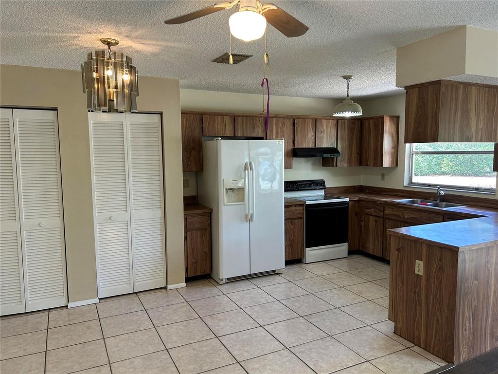 Photo of 8907 Wayward Circle, Hudson, FL 34667 (MLS # O6407239)