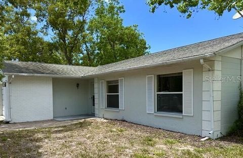 Photo of 8907 Wayward Circle, Hudson, FL 34667 (MLS # O6407239)