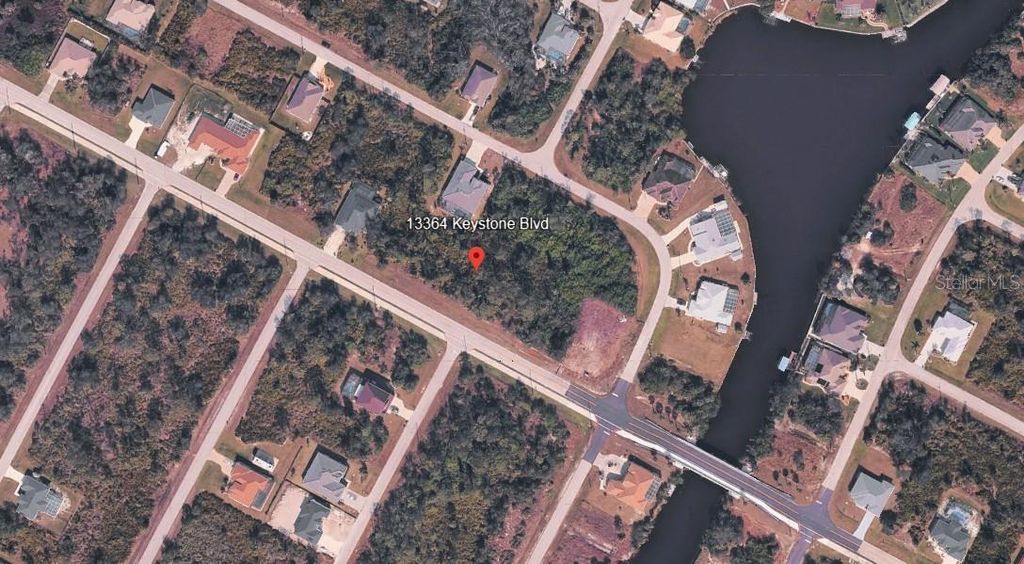 Photo of 13364 Keystone Boulevard, Port Charlotte, FL 33981 (MLS # C7519307)