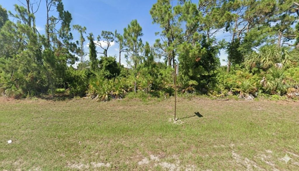 Photo of 13364 Keystone Boulevard, Port Charlotte, FL 33981 (MLS # C7519307)