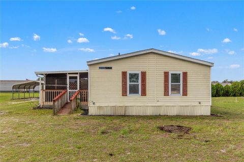 Photo of 1371 NW 12th Lane, Lake Panasoffkee, FL 33538 (MLS # G5110759)