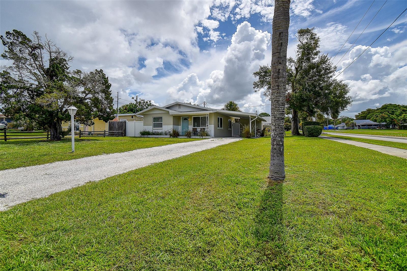 Location, Location, Location!
This charming, updated 2-bedroom, 1-bath home is perfectly situated in the heart of Downtown Palm Harbor—just steps or a quick golf cart ride away from vibrant restaurants, local bars, boutique shopping, and the scenic Pinellas Trail. Whether you prefer walking, biking, or cruising around on a golf cart, this friendly and walkable neighborhood offers it all!
Set on an oversized corner lot, this home exudes a mid-century modern vibe and is just a few blocks from Palm Harbor’s best recreation spots. The Pinellas Trail—ideal for biking, jogging, rollerblading, or leisurely strolls—runs nearby, connecting you to even more dining and entertainment along the way.
Inside, you’ll find a bright, open layout with neutral tones, terrazzo flooring, and impact windows that flood the space with natural light. The updated kitchen features modern white cabinetry, quartz countertops, a stylish tile backsplash with accent wall, stainless steel appliances.
Both bedrooms are generously sized, offering terrazzo flooring & large windows. The renovated bathroom boasts a sleek vanity and a tile shower/tub combo for a clean, modern feel.
Outside: fully fenced yard with brick paver patio—perfect for entertaining or relaxing.
Small dog only, no smoking inside or outside. Tenant responsible for lawn, electric, water, cable and internet.
1st, last & security. Application fee per person over 18.