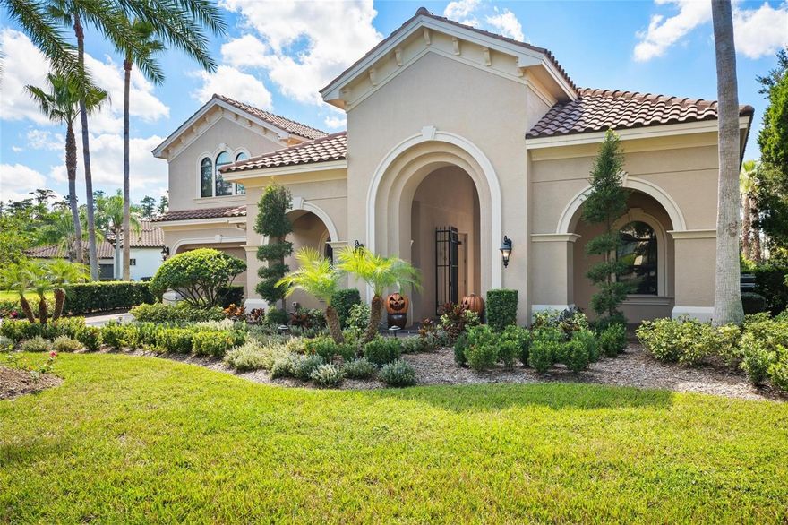 Welcome to Ladera Estates, one of Lutz’s premier gated communities, where privacy, elegance, and lakefront living converge. This executive estate spans 5,564 square feet of refined living space and offers an unmatched blend of craftsmanship, functionality, and modern upgrades, designed for those who appreciate luxury with purpose.
A stately tile roof and pavered drive framed by manicured landscaping lead to a charming front courtyard, setting the tone for the home’s timeless sophistication. Within the courtyard is a private in-law suite with a full bath and its own entrance, ideal for extended family or long-term guests. Enter the front door to soaring ceilings, architectural details, and walls of glass that create a bright, open flow perfect for entertaining or quiet retreat.
This five-bedroom, six-bathroom residence features a newly renovated chef’s kitchen that anchors the heart of the home, with professional-grade appliances, quartz surfaces, custom cabinetry, and an oversized island and bar top built for gatherings. Beyond, the expansive great room transitions seamlessly to the formal dining room, a sitting room with fireplace, and a dedicated theater room offering the perfect space for movie nights or entertaining guests.
Step outside to your own private resort and enjoy the sprawling pool, grilling pavilion, and outdoor kitchen overlooking the tranquil waters of Lake Merry Water. The expansive backyard provides room to relax or entertain while taking in peaceful lake views. Whether hosting a sunset dinner or enjoying a quiet morning coffee by the lake, this setting delivers the Florida lifestyle at its finest.
Practical features elevate everyday living, including a whole-house on-demand generator, newer mechanical systems, and a three-car garage with abundant storage. Located in a private, gated setting yet only a short drive to Tampa, this home offers the perfect balance of seclusion and convenience.
Every detail, from the stone finishes to the integrated sound system, reflects thoughtful design and enduring quality.