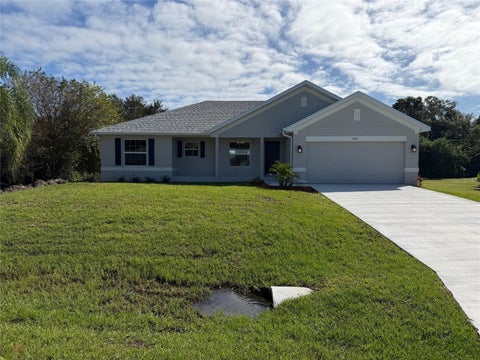 Photo of 1092 Archer Street, Port Charlotte, FL 33952 (MLS # C7531896)