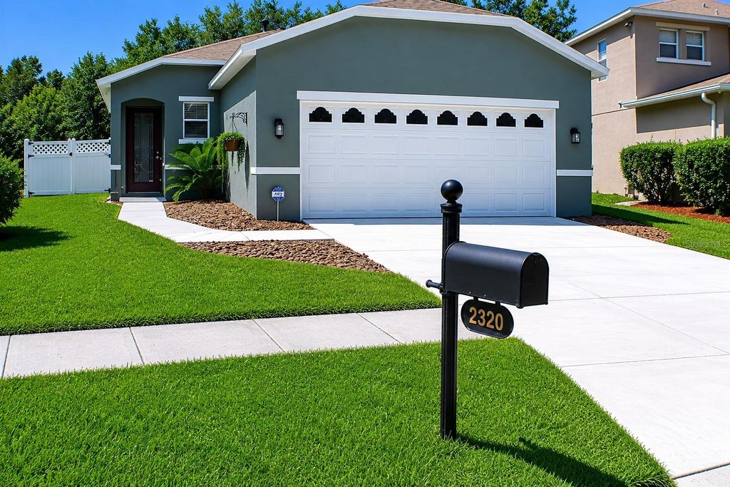 Photo of 2320 Spring Hollow Loop, Wesley Chapel, FL 33544 (MLS # TB8512307)