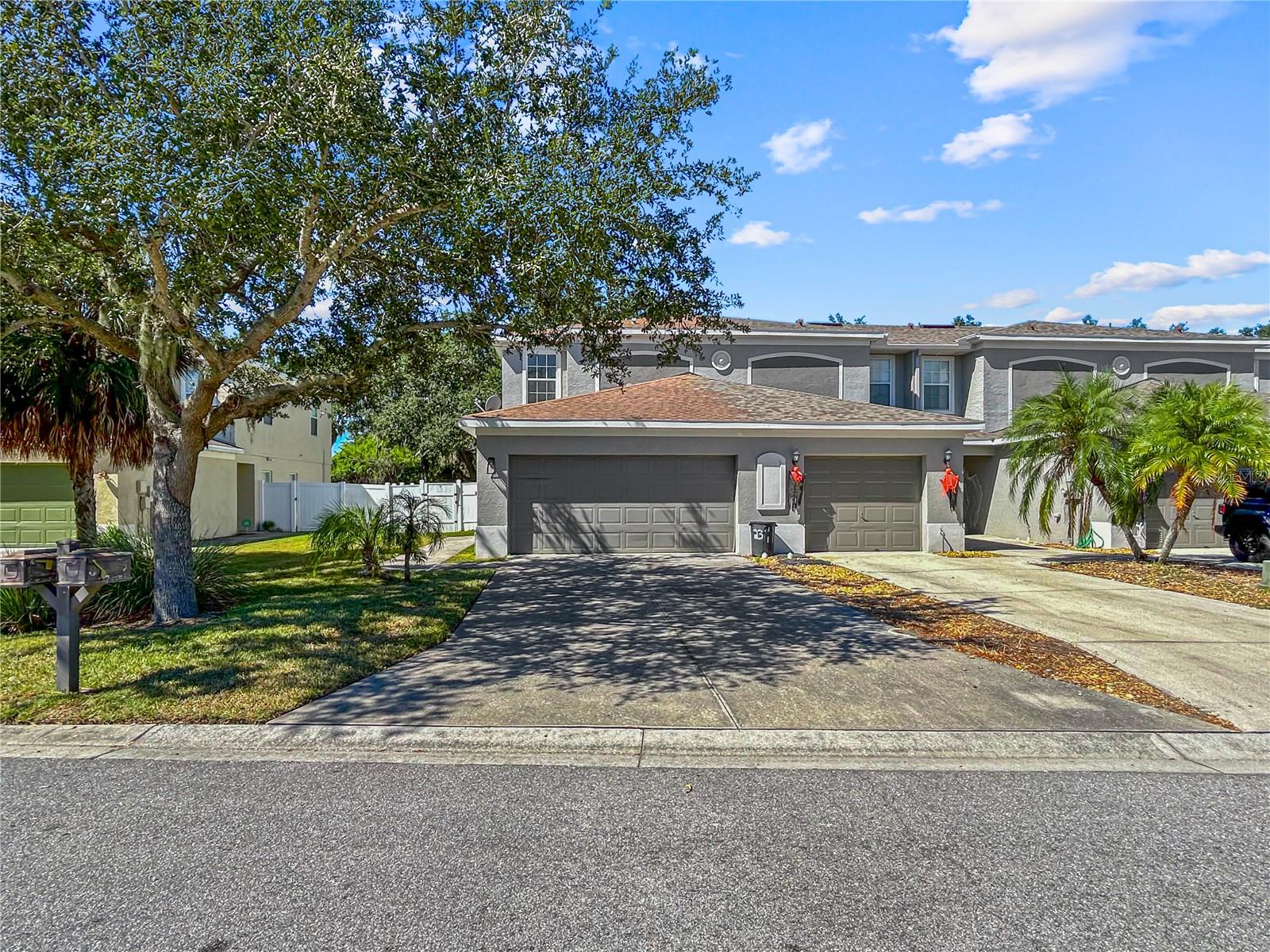 Welcome to 2341 28th Ave E, a stunning beautifully updated  3-bedroom, 2.5-bath home with a 2-car garage located in the sought-after Carpentras of the Villages of Avignon. Perfectly positioned near I-75 and US-301, you’ll enjoy quick access to Tampa, St. Pete, and Sarasota, as well as nearby shopping, dining, and Gulf Coast beaches. Step inside to find a freshly updated interior featuring brand-new luxury plank flooring, new carpet throughout, and fresh paint that gives the entire home a bright, modern feel. The spacious open-concept layout includes a large living and dining area, a functional kitchen, and sliding doors leading to a private backyard patio—perfect for relaxing or entertaining. Upstairs, you’ll find all three bedrooms, including a generously sized primary suite complete with a private en-suite bath and walk-in closet. The home also features a brand-new A/C system, ensuring comfort and peace of mind for years to come. Located in a quiet, low-HOA community, this home offers the perfect blend of comfort, convenience, and value. Ideal for first-time buyers, families, or investors, this move-in-ready home is a rare find in today’s market.