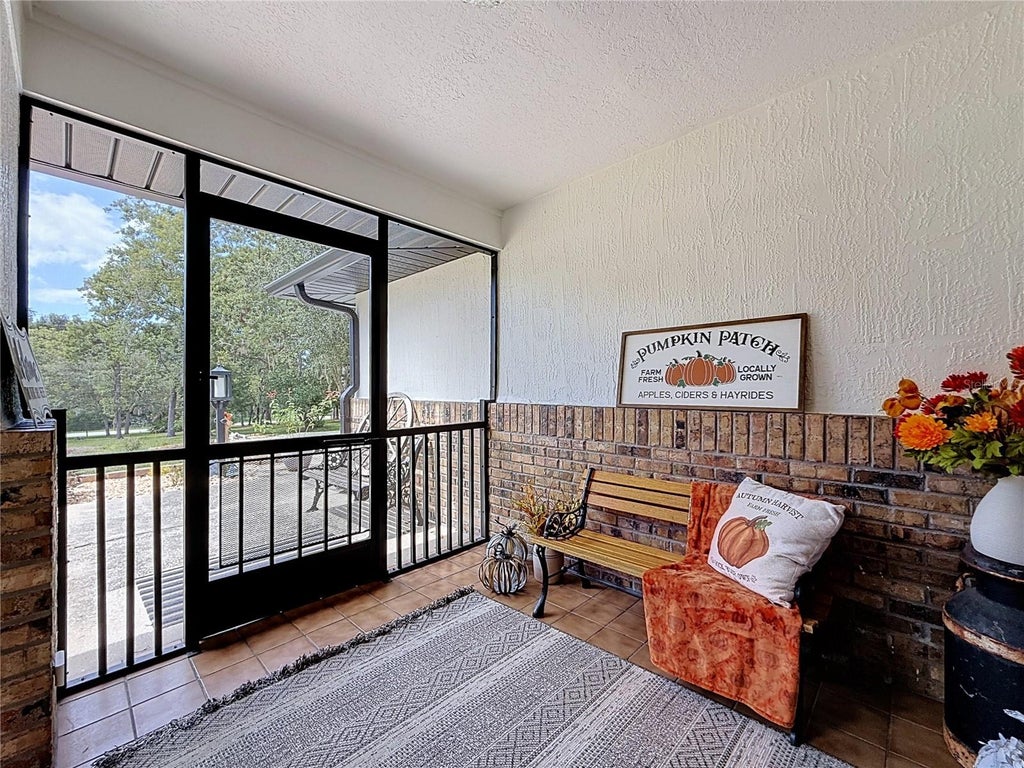 Photo of 9238 Tree Top Lane, Hudson, FL 34669 (MLS # W7889480)