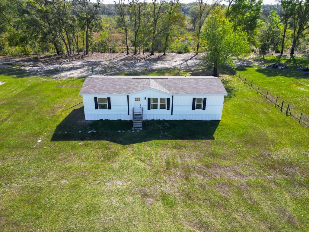 Photo of 5570 NE 76th Terrace, High Springs, FL 32643 (MLS # TB8487758)