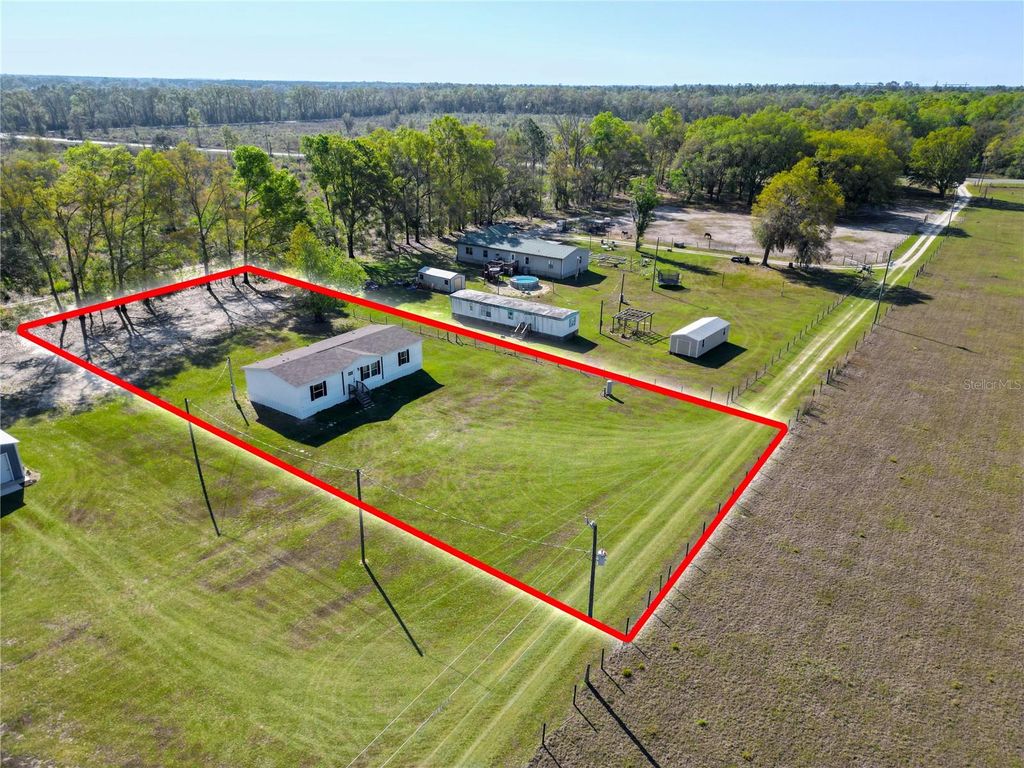 Photo of 5570 NE 76th Terrace, High Springs, FL 32643 (MLS # TB8487758)