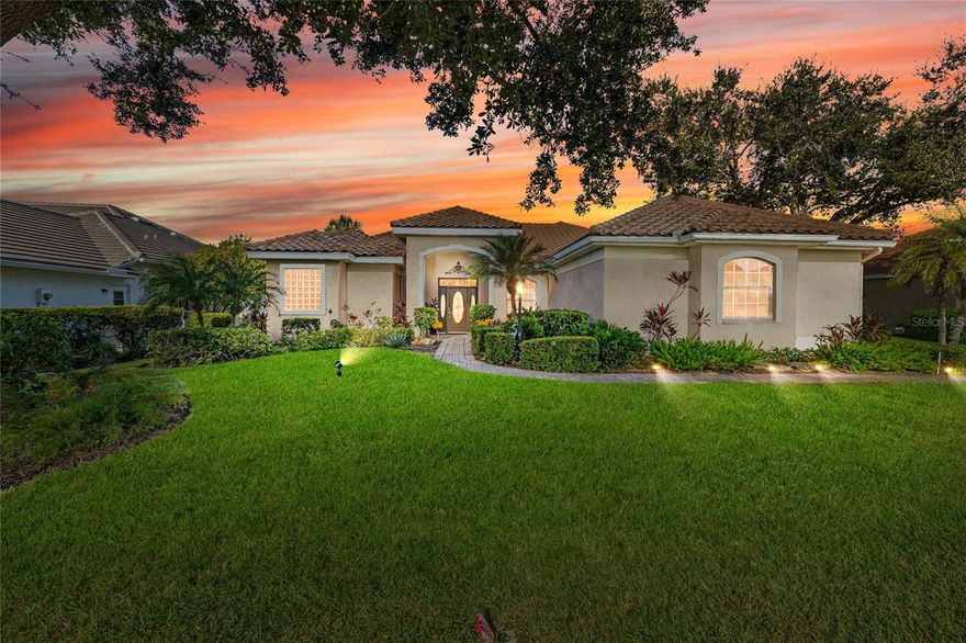 Beautiful 3 Bedroom, 3 Bath Home with DEN and Stunning Golf Course & Pond Views! Enjoy elegant living in this spacious home overlooking the 12th fairway in member-owned Venice Golf & Country Club where a Golf Membership is IMMEDIATELY available to the new owner. Step inside into foyer and the sunny living room which faces west and has an amazing sunset view!  The separate dining room and family room both have tray ceiling ceilings. There is crown molding throughout the foyer, living room, dining room, family room, DEN, kitchen, and hallway. The den features hardwood flooring, while ceramic tile flows through the main living areas for easy maintenance. The kitchen with breakfast bar, granite countertops, and pantry is just the right size and has separate breakfast area. This home was thoughtful designed with a split floor plan which provides privacy when entertaining overnight guests. The primary suite boasts a fabulous view, a large en-suite bath with dual vanities, and has sliding glass doors to the lanai. There are two guest bedrooms with a separate bath. The third bathroom has easy access ro the lanai and is adjacent to the den. Step outside from the living room and family room to the large, covered lanai with a heated pool and spa. Its generous size has plenty of space for outdoor dining and lounging. For peace of mind the house was re-piped in 2011 and a new roof and pool cage with panoramic screen were installed in 2023.  Venice Golf & Country Club is a community of only 587 homes and is known for its 18-hole championship course, 23 ponds, and 13 natural preserves. Members enjoy access to tennis, club pool, bocce courts, a clubhouse with both formal and casual dining, and a separate bar overlooking the 18th tee. On cooler evenings sit with friends around the fire pit. The Wellness Center features state-of-the-art equipment and offers a vaiety of fitness classes, spa services, personal trainers, and physical therapist on site. There is truly something for everyone in this friendly and welcoming community where you will meet and make new friends that last a lifetime. It is conveniently located a few miles from the quaint town of Venice, gulf beaches, the Atlanta Braves practice stadium, and just 20 miles south of Sarasota. Florida living at its best! MEMBERSHIP IS MANDATORY.