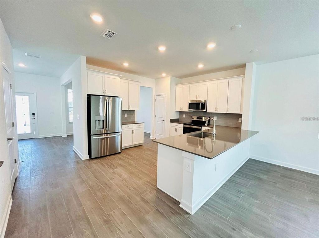 Photo of 11756 Language Way, Orlando, FL 32832 (MLS # S5149413)