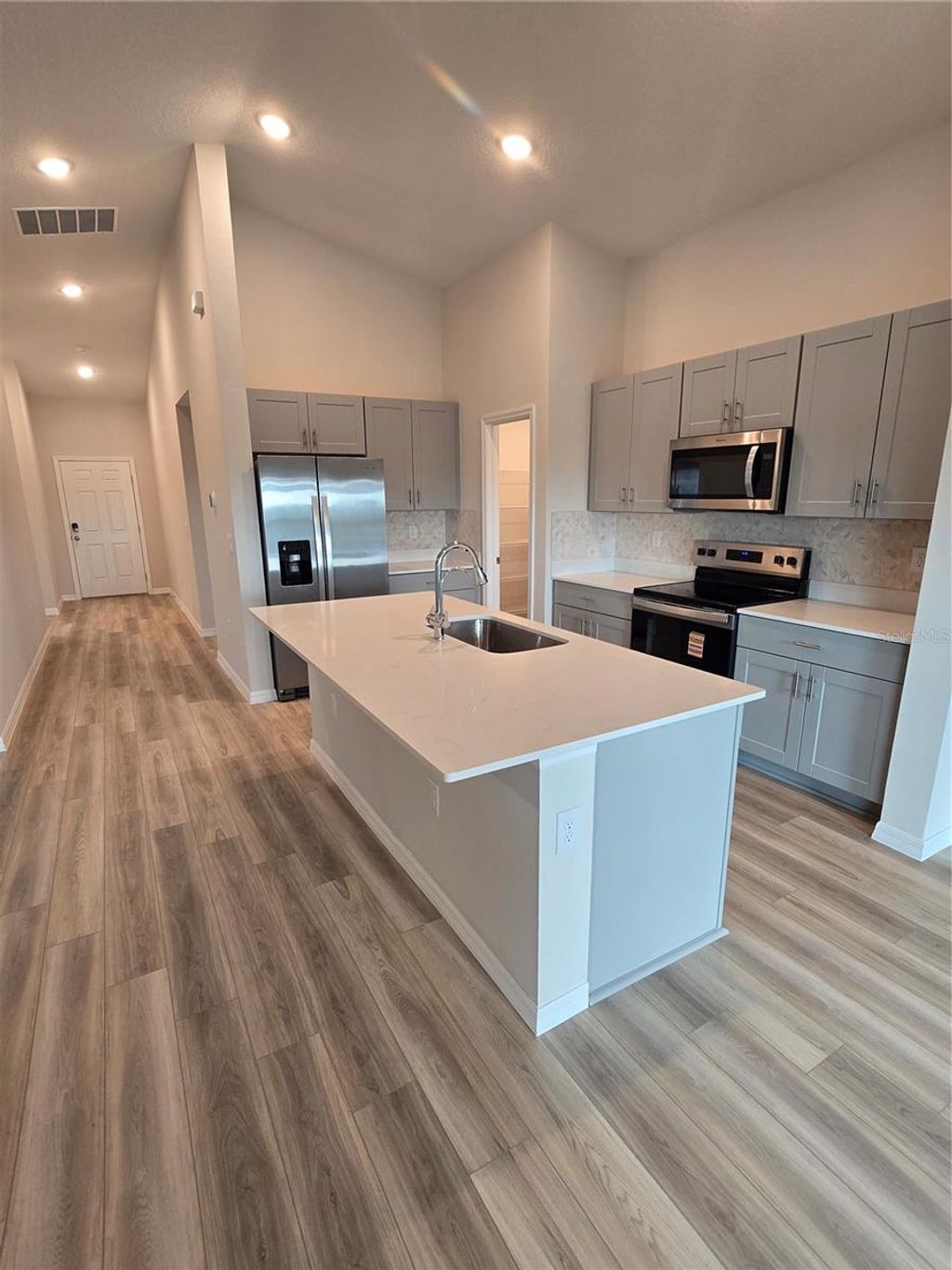 Photo of 1712 Vanilla Street, Haines City, FL 33844 (MLS # O6402333)