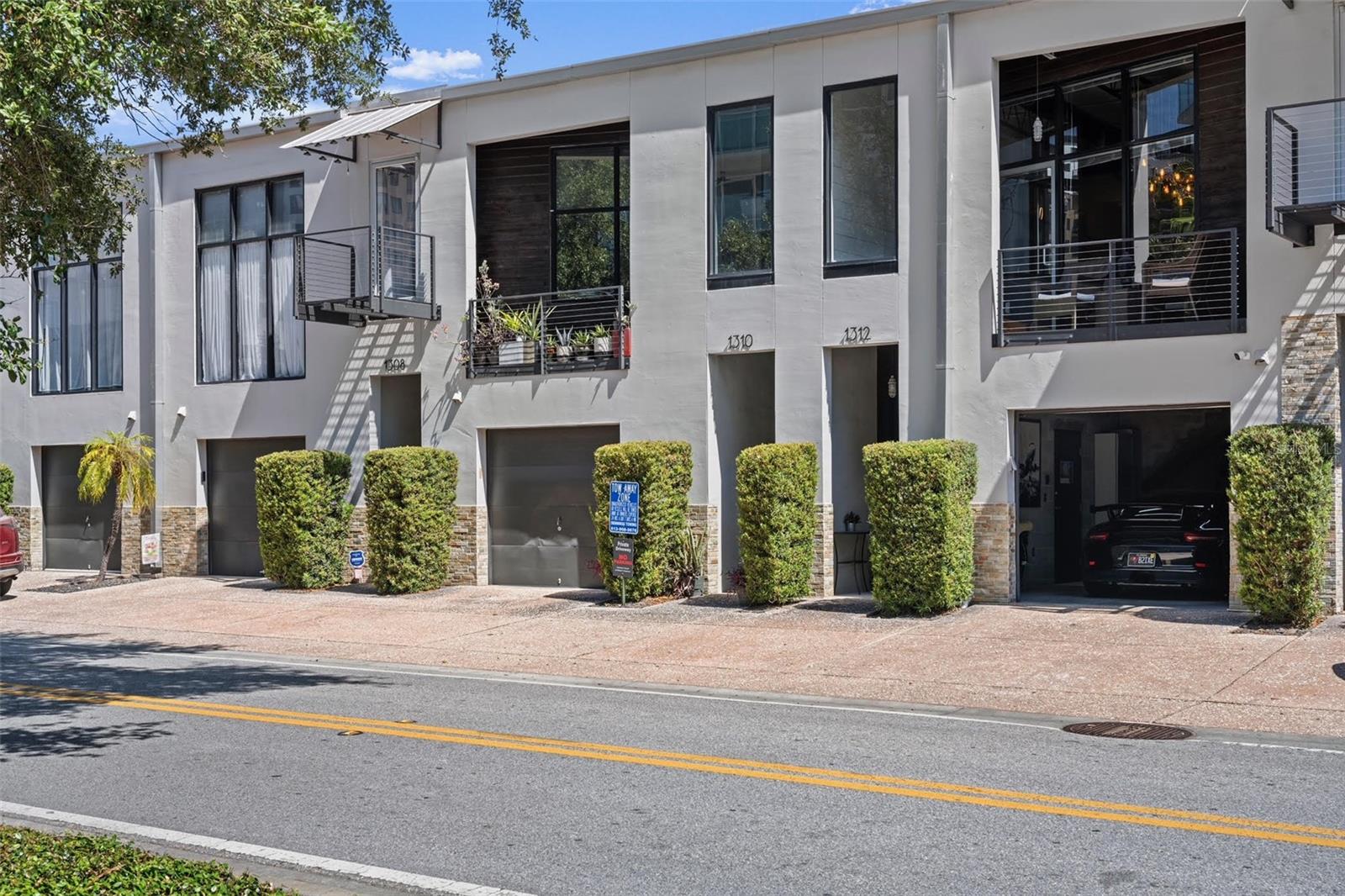 Welcome to your one-of-a-kind downtown Tampa Loft Townhouse in the coveted Channelside District, where urban sophistication meets modern downtown living. This rare two-bedroom, two-bathroom loft-style residence spans 1,207 square feet and showcases the perfect blend of luxury and convenience in one of Tampa's most dynamic districts.
Step inside to discover a completely renovated interior featuring stunning luxury large plank vinyl flooring throughout and floor-to-ceiling oversized format tile in both bathrooms. The heart of this home is the custom kitchen, boasting an enormous two-tier island that comfortably seats six guests and soaring eleven-foot perimeter cabinets with a distinctive sliding ladder design that adds both function and flair.
The private balcony offers captivating downtown views in one direction and glimpses of majestic cruise ships navigating the channel in the other – your daily dose of urban theater from the comfort of home.
Location is everything, and this townhouse delivers in spades. Washington Street Park sits practically at your doorstep, just steps away for morning jogs or evening strolls. Tampa Union Station provides convenient transit options nearby, hop on a scooter or E-bike in any direction you look, take the trolley or call yourself a DASH ride, all while Duckweed Grocery ensures your shopping needs are easily met, less than a block from home or take a walk to either of two Publix grocery stores, one in Channelside and the other on Water Street.
The Channelside neighborhood puts you within walking distance of Water Street, Sparkman Wharf, the scenic Riverwalk, premier fitness centers, multiple dog parks, diverse dining establishments, entertainment venues, the Florida Aquarium, and Amalie Arena. With this incredible walkability, owning a vehicle becomes more choice than necessity.
This rare opportunity combines luxury living with unmatched convenience in Tampa's most exciting downtown district.