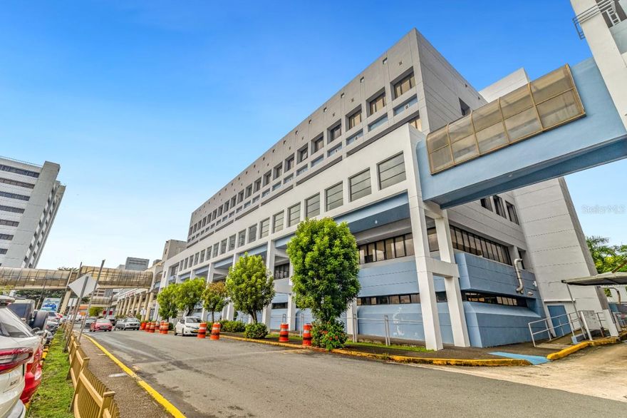 This 1,044 sq. ft. medical office, located in Bayamón, Puerto Rico, is a well-designed medical facility optimized for patient care and comfort. The space is divided into multiple functional areas, including examination rooms, waiting areas, and specialized treatment spaces. Each room is equipped with dental chairs, overhead lighting, and X-ray machines. The waiting areas feature comfortable seating arrangements, with Large windows in some rooms that allow natural light to filter in, brightening the space. The office maintains a clean, professional appearance with tiled floors and drop ceilings with integrated lighting. Storage solutions are integrated throughout the office to keep supplies organized and easily accessible. The office's layout is designed for efficient patient flow, with clearly marked rooms and ample space for staff to move between areas. Despite its compact size, the 1,044 sq. ft. space is well-utilized, providing a comprehensive range of dental services in a comfortable, professional environment.