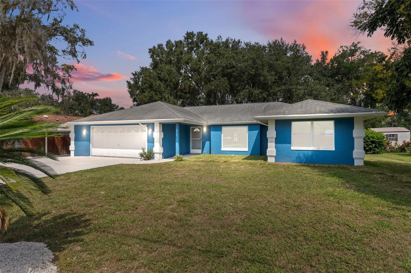 Beautifully Renovated Lakefront Home!!!
This fully remodeled 3-bedroom, 2-bath home combines modern style with tranquil lakefront living — just minutes away from picturesque downtown Inverness, where you’ll find shopping, dining, trails, live music, and community events.
Step inside to discover a bright, open layout with new LVP flooring, energy efficient LED lighting, and stylish finishes throughout. The brand-new kitchen features soft-close cabinets, butcher block countertops, tile backsplash, under-cabinet lighting, all new appliances, deep basin sink, and a built-in coffee bar/credenza. Each of the bathrooms have been upgraded with stunning tile accents, new vanities, toilets, and exhaust fans.
Enjoy water views from the kitchen, dining room, primary suite, and enclosed porch. With a large picture window in the living room, and a wall of windows in the back, this house is flooded with natural light!
Outside, the backyard provides plenty of space for pets, entertaining, even space to add a dock for boating and fishing.
The newly painted driveway can fit several vehicles, along with additional space under the attached carport, AND a two-car attached garage. Invite all your family and friends for your housewarming party!
Additional highlights include:
• High and Dry – NO flood insurance required!
• NO HOA.
• Fully permitted underpinning of foundation (completed repair).
• Extra storage space available in the fully enclosed 160 sq ft detached shed.
• New appliances.
• Updated lighting and electrical throughout.
• Enclosed porch with lake views.
• Whole-house water softener and filtration system.
• Recent AC service and well maintenance in 2025.
With all major updates completed, this property is truly turn-key and ready for you.
Whether you’re seeking a full-time residence, vacation getaway, or a profitable Airbnb investment property, this lakefront home offers the best of Florida living with the bonus of strong rental potential.