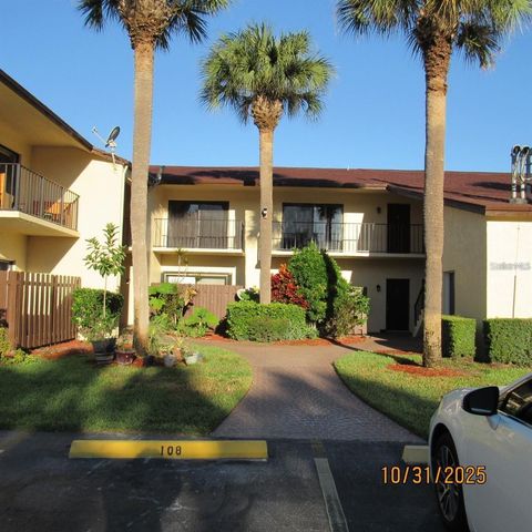 Photo of 2050 Oleander Boulevard #2-104, Fort Pierce, FL 34950 (MLS # O6376690)