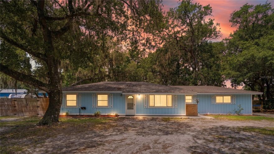 Situated on a spacious .43-acre homesite in a convenient St. Augustine location, this updated 3 bedroom, 2 bathroom home offers the perfect blend of comfort, style, and functionality. Inside, you’ll find tile flooring throughout with absolutely no carpet, creating a clean and cohesive feel across the entire home. The updated kitchen features solid wood cabinetry, leathered granite countertops, and ample workspace for cooking and entertaining. Both bathrooms have been tastefully renovated with subway tile showers and modern finishes. The living area is anchored by a cozy wood-burning fireplace, adding warmth and character to the space. Enjoy relaxing year-round from the fully screened lanai overlooking the backyard with plenty of room to enjoy the privacy and outdoor space. Additional highlights include a newer HVAC system and a highly convenient location just 5 minutes to Publix, 15 minutes to Crescent Beach, and 15 minutes to Historic Downtown St. Augustine. A rare opportunity to own a move-in ready home on nearly half an acre with no HOA in one of St. Augustine’s most accessible locations.