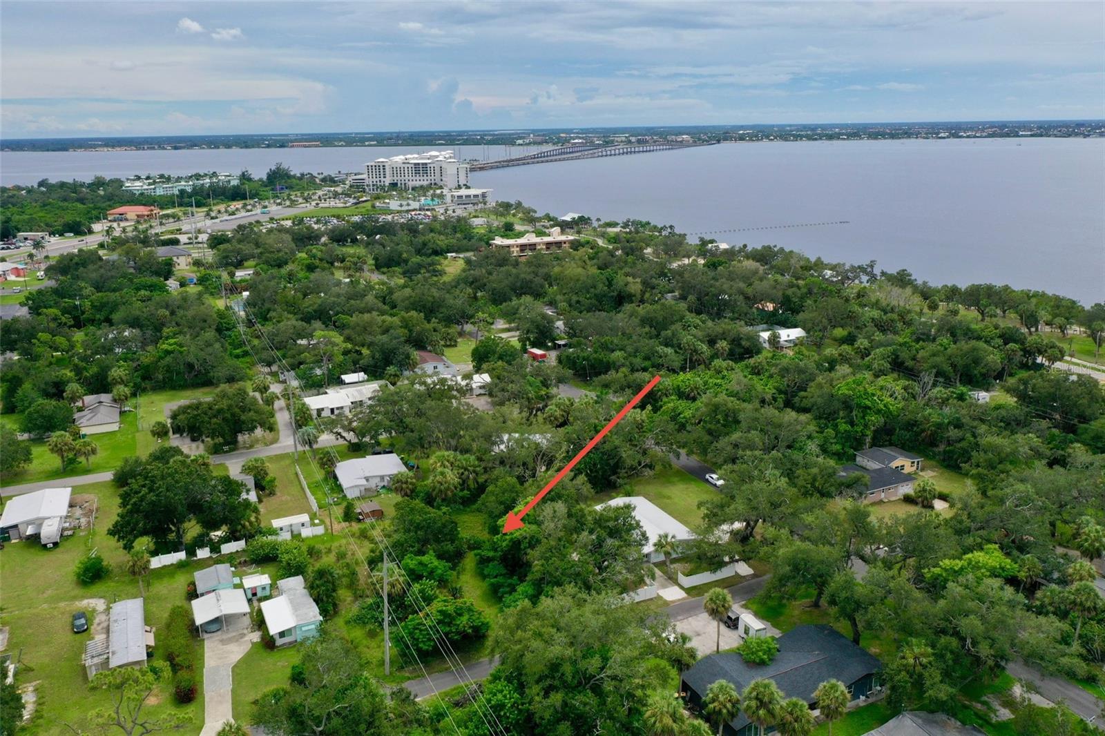 Fantastic investment opportunity to build your home in Charlotte Harbor. This property is .32 Acre(14,022 sqf) or 113ft x123ft. You have harbor views nearby with a short walk to the park just down the street, access to the waterfront and the benefit of mature landscaping surrounding the property. The Sunseeker Resort is within a 10 minute walk or 0.5 miles away, featuring 21 restaurants with different bar and dining options! This quiet residential area reflects the Old Florida Lifestyle of waterfront communities. The property is very close to several other shopping areas (including the Port Charlotte Town Center), great restaurants, and the Charlotte County Sports Park which hosts the Tampa Bay Rays during Spring Training. For all Golfers, there are enough golf courses to play a different one every day of the week! The property is also located within 30 minutes to some of the areas best beaches! Don't miss your opportunity to purchase this property today!