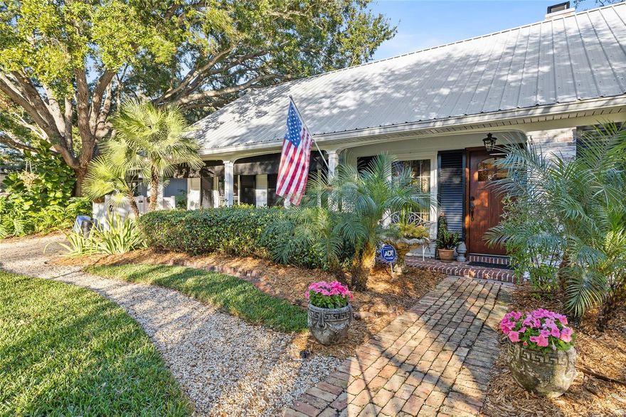 This amazing SUNSET PARK home located in beautiful South Tampa offers so many features you may run out of ink checking things off your desirabilty list!  FIRST FLOOR PRIMARY BEDROOM? Check! Accompanied by a LARGE PRIMARY BATH featuring a GLASS ENCLOSED SHOWER, separate SOAKING TUB, dual sinks, and a SMART COMMODE in the water closet, this peaceful retreat may be this home's shining feature. Loaded with CROWN MOLDINGS, CHAIR RAILS and PICTURE FRAME MOLDING throughout the first floor, you'll enjoy a large formal Dining Room, Front-facing Study/Office, and a CULINARY FANATIC'S KITCHEN that features FULL HEIGHT UPPER WOOD CABINETS with crown molding, a FARM SINK, SOLID STONE COUNTER TOPS, LARGE 13' LONG PREP ISLAND with separate PREP SINK, UNDER-COUNTER MICROWAVE, BEVERAGE REFRIGERATOR, WOLF 6 BURNER GAS RANGE with DOUBLE OVEN and IN-WALL POT FILLER, and a SUBZERO REFRIGERATOR. The kitchen flows into the comfortable BREAKFAST NOOK enhanced by a WOOD BURNING BRICK FIREPLACE with DISTRESSED WOOD-SCONCED MANTLE. While these 2 rooms lend themselves beautifully to entertaining, wait until you see the HUGE FAMILY ROOM through the FRENCH STYLE BARN DOORS.  This 460 sf family room offers WOOD FLOORING, BUILT-IN WOOD BOOKSHELVES, a 2nd WOOD BURNING BRICK FIREPLACE with DISTRESSED WOOD-SCONCED MANTLE, a closet with BUILT-IN DRAWERS AND SHELVING, and a ceiling that features ELEGANT WOOD BEAMS - all looking out to the SCREEN ENCLOSED, IN-GROUND POOL, with COVERED PATIO  accompanied by an OUTDOOR SHOWER, and AIR CONDITIONED CABANA WITH FRENCH DOORS (currently be used as a work shop.)  Make sure while viewing the backyard to take note of the HOT TUB PAGODA and dream about the soothing therapy that it can provide.  Back inside, before heading upstairs check out the tastefully appointed POWDER ROOM and the LARGE UTILITY ROOM, featuring the laundry area, utility tub and built-in cupboard, that leads out to the 2 car garage with additional workshop space. As you pass back through the breakfast nook, head up the stairs, past the EXPOSED BRICK of the fireplace to the secondary sleeping chambers with 3 BEDROOMS, 1 FULL HALL BATH with 1 of the bedrooms being an ENSUITE BEDROOM.  Also upstairs you'll find an AIR CONDITIONED WALK IN ATTIC SPACE to store things that might be heat sensitive and wouldn't fare well in the garage.  While all the features of this amazing home hopefully caught your attention, the location of this home certainly deserves some attention.  This address is close to everything that makes South Tampa special.  BALL FIELDS, PUBLIC TENNIS COURTS, INDEPENDENT COFFEE SHOPS AND RESTAURANTS, LOCATED MINUTES FROM DOWNTOWN TAMPA, TAMPA INTERNATIONAL AIRPORT, MALLS and MOVIE THEATERS yet still CLOSE TO PARKS while having QUICK ACCESS TO 3 BRIDGES LEADING TO THE BEACH COMMUNITIES OF PINELLS COUNTY are all defining characteristics of this Sunset Park home! Welcome home!