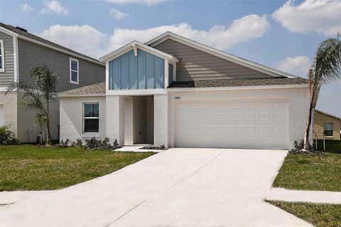 Photo of 31694 Baronne Street, Wesley Chapel, FL 33545 (MLS # J1002702)