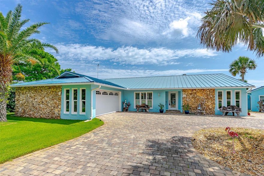 DIRECT RIVERFRONT FAMILY COMPOUND. THIS ONE-OF-A-KIND CUSTOM-BUILT HOME IS UNBELIEVABLE. ONE OF THE LARGEST RIVERFRONT PROPERTIES ON THE DEEPEST PART OF THE RIVER. SET BACK AND SECLUDED WITH A PAVED CIRCULAR DRIVEWAY. GUTTERS AND DOWNSPOUTS ON BOTH THE MAIN HOME AND GUEST HOME. THE BACKYARD HAS BEEN SODDED WITH BERMUDA GRASS, SO PUT IN A PUTTING GREEN! THE MAIN HOME HAS AN OPEN FLOOR PLAN WITH THE KITCHEN, DINING ROOM & LIVING ROOM, AND ONE LARGE OPEN AND BRIGHT SPACE -30’ X 26’. THE CABINETS ARE CUSTOM-MADE WITH SOFT-CLOSE DOORS AND DRAWERS. THERE IS LOTS OF COUNTER SPACE AND STORAGE SPACE TO PLEASE EVEN THE PICKEST GOURMET COOK. THE CENTER ISLAND IS 3X6 WITH ADDITIONAL CABINETS AND STORAGE. ALL COUNTERTOPS ARE BEAUTIFUL MATCHING QUARTZ. TOP-OF-THE-LINE APPLIANCES AND NEW PORCELAIN TILE THROUGHOUT. THE CUSTOM CEILINGS IN EACH ROOM PRESENT DIFFERENT HIGH-END STYLES FROM COFFERED, COVE, CATHEDRAL, AND TRAY CEILINGS. THE WOW FACTOR IS AMAZING. THE FAMILY ROOM IS 28 X 13 AND FEATURES BEAUTIFUL IMPACT-RESISTANT WINDOWS THAT GIVE YOU A FULL VIEW OF THE DEEP RIVER AND ALL THE BOATS AND YACHTS PASSING BY. THE WHOLE HOUSE HAS IMPACT-RESISTANT WINDOWS AND BOTH GARAGES HAVE HURRICANE-RESISTANT GARAGE DOORS. THE CUSTOM SLIDER LEADS OUT TO THE COOL DECK AND THE OVERSIZED INGROUND POOL. THERE IS LOTS OF SPACE FOR SEATING GUESTS AND A SUMMER KITCHEN WITH A TV FOR YOUR ENTERTAINING PLEASURE. LIGHTING IN THE PALM TREES, AROUND THE SUMMER KITCHEN, AND AT THE BOAT HOUSE AND DOCK MAKE FOR A BEAUTIFUL NIGHTTIME EXPERIENCE. THE ENTIRE HOME HAS CUSTOM CROWN MOLDING AND FLOOR TRIM. ALL BEDROOMS ARE LARGE AND THE GUEST BATH IS CENTRALLY LOCATED WITH THE NEW TUB/SHOWER AND TILE. THE MAIN BEDROOM HAS 3 SEPARATE ROOMS – THE BEDROOM IS 19X13.7, THE DRESSING ROOM/OFFICE IS 14.7 X 9 & BATH IS 12 X 12 WITH A 6.5 FT SHOWER PLUS A WALK-IN CLOSET. THE WINDOWS IN THE MAIN BEDROOM LOOK OUT OVER THE POOL AND THE WATERFRONT. THE GUEST HOUSE IS ONLY A FEW FEET AWAY FROM THE MAIN HOUSE AND IT IS A LARGE OPEN LIVING AREA WITH A FULL KITCHEN, FULL BATH, AND A SEPARATE GARAGE AND WORKSHOP. THE DOCK AND BOAT HOUSE ARE ONLY STEPS FROM THE PROPERTY AND FEATURE SEVERAL BOAT DOCKING SPACES AND A SEPARATE  COVERED BOAT LIFT AND ENTERTAINMENT AREA AND TIKI BAR. THIS IS LOCATED ON ONE OF THE DEEPEST PARTS OF THE INTERCOASTAL SO IT CAN ACCOMMODATE LARGE BOATS OR EVEN A YACHT. PLENTY OF ROOM FOR AN RV OR BOAT OUT OF THE WATER. WHAT A VIEW AND WHAT A BEAUTIFUL PROPERTY. A DREAM HOME FOR SURE. ;Water: City