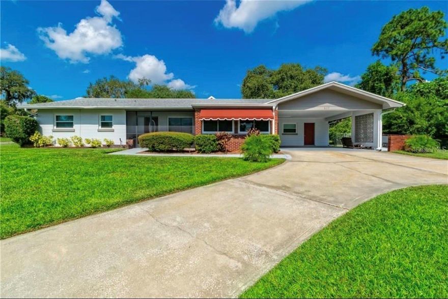 Discover the perfect blend of character, comfort, and convenience at this charming mid-century modern home near beautiful Lake Lulu! Featuring 3 bedrooms and 3 bathrooms, this unique property offers flexible living space with a private mother-in-law suite complete with its own entrance through the carport — ideal for multi-generational living, a young adult retreat, guest quarters, or even a spacious primary suite.

Inside, you’ll find timeless mid-century charm paired with thoughtful updates, including newer double-pane windows and sliding glass doors that bring in natural light while improving energy efficiency. The AC and roof are both only 8 years old, and the home also features a newer water heater for added peace of mind.

Located just moments from shopping, dining, and the renowned Chain of Lakes, this home puts you close to everything Winter Haven has to offer — all with NO HOA and NO CDD fees! Whether you’re looking for a primary residence, an investment opportunity, or a home with room to grow, this one is full of possibilities and ready for you to make it your own.