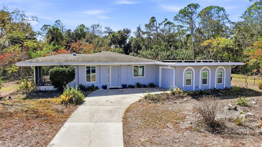 CHARMING PORT CHARLOTTE HOME WITH 2 PATIOS & BONUS FAMILY ROOM!

Welcome to this delightful 2-BEDROOM, 2-BATH home in DESIRABLE PORT CHARLOTTE — offering the PERFECT BLEND of comfort, flexibility, and TRUE FLORIDA LIVING! Situated on a GENEROUS OVERSIZED CORNER LOT in a peaceful, well-established neighborhood, this property delivers space, privacy, and versatility both inside and out.

Step inside to discover a LIGHT-FILLED FLOOR PLAN designed for everyday living and effortless entertaining. The versatile BONUS FAMILY ROOM provides endless possibilities — create a media room, hobby space, home office, playroom, or additional lounge area tailored to your lifestyle. The comfortable main living areas flow seamlessly, creating a welcoming atmosphere you’ll feel the moment you walk through the door.

The WELL-APPOINTED KITCHEN offers ample cabinetry and storage, a BRAND-NEW RANGE, and convenient access to the dining and living spaces. A NEW WASHER AND DRYER add everyday practicality and peace of mind.

The spacious PRIMARY SUITE provides room for a reading nook, office corner, or cozy sitting area, along with an ENSUITE BATH that ensures privacy and convenience. The second bedroom and bath are ideal for guests or family.

Outdoor living truly shines here! Enjoy TWO SEPARATE OUTDOOR SPACES — a SCREENED-IN SIDE LANAI perfect for morning coffee or evening relaxation, plus a PRIVATE BACK PATIO ideal for weekend BBQs and gatherings. The oversized corner lot features MATURE LANDSCAPING, including FOUR ROYAL POINCIANA TREES and ONE JACARANDA TREE, creating vibrant seasonal color and added curb appeal.

Additional highlights include ENERGY-SAVING SOLAR to help reduce utility costs and improve efficiency, along with a ROOF INSTALLED IN 2018 for added peace of mind.

Conveniently located near shopping, dining, parks, and with EASY ACCESS TO MAJOR ROADWAYS, this home offers the perfect combination of COMFORT, SPACE, AND LOCATION.

DON’T MISS YOUR OPPORTUNITY to own this versatile and charming Port Charlotte property — schedule your showing today!