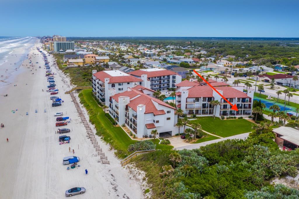 Highly sought-after Las Brisas unit, very few of these become available. This unit is a beautiful and private flat with astonishing views of the Atlantic Ocean. This spacious unit has plenty of room for a larger family with an amazingly comfortable layout. Entering this unit, you will not feel cramped. The main living area allows for spacious seating opening to a covered porch overlooking the Atlantic. Kitchen has been tastefully updated with new cabinets and beautiful butcherblock countertops. Updated flooring, appliances, new air conditioning, Anderson impact windows and sliding doors. Unit is being offered fully furnished. Many updates but the view and convenience to the beach is remarkable. ;Water: City
