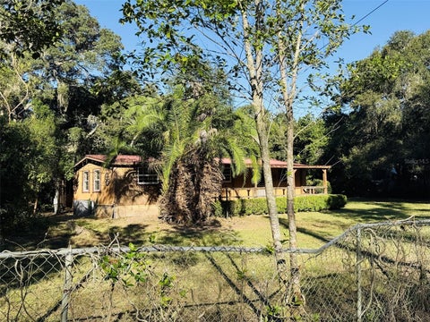 Photo of 9690 SE 38th Court, Belleview, FL 34420 (MLS # W7890486)
