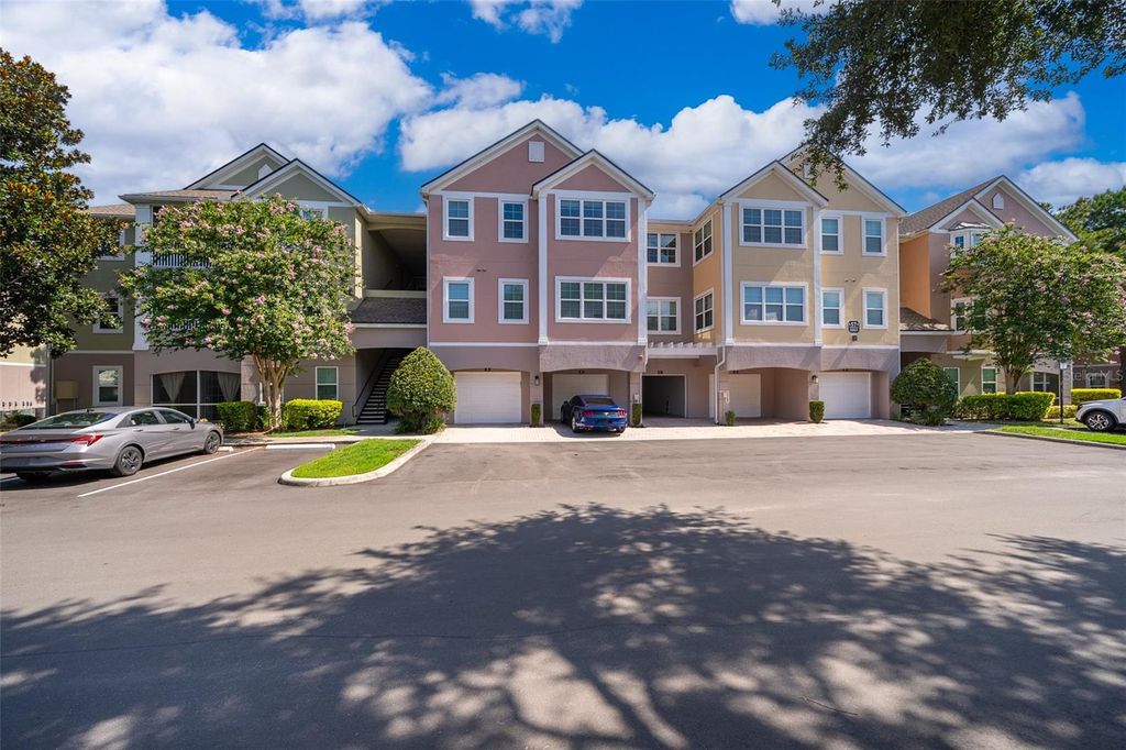 Photo of 6663 Queens Borough Avenue #101, Orlando, FL 32835 (MLS # O6407430)