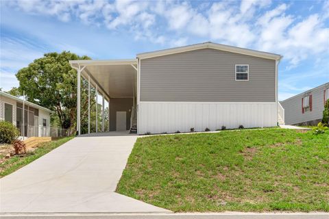 Photo of 8857 Highpoint Boulevard, Brooksville, FL 34613 (MLS # O6299304)